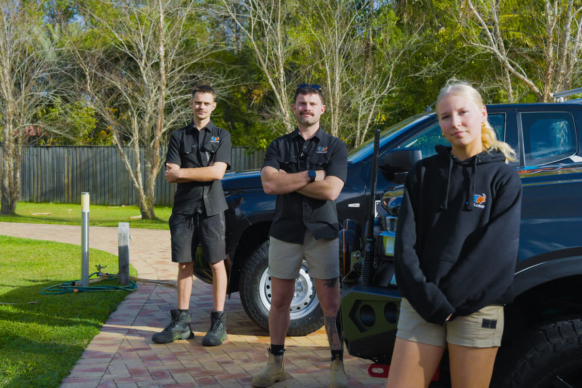 The Oxplumb crew of three beside the ute